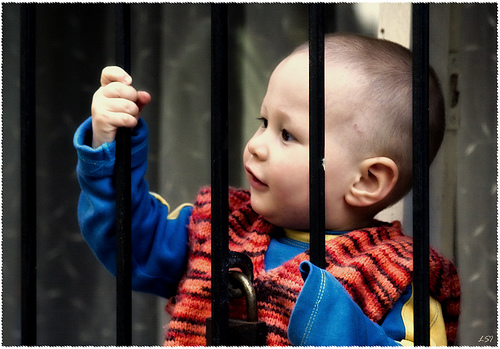child behind bars