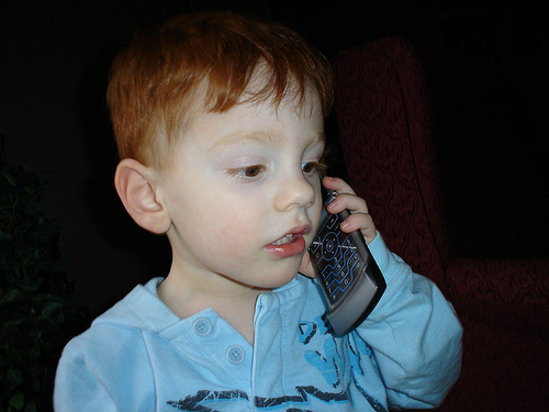 boy talking on phone